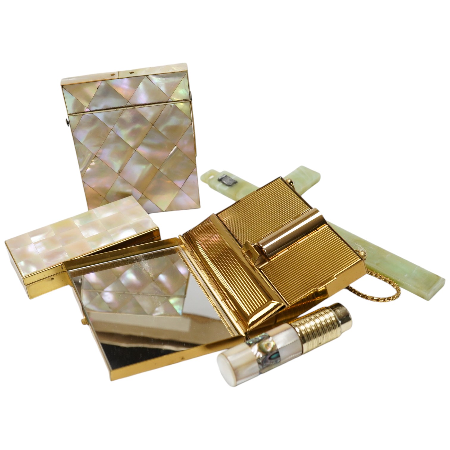 A collection of mother-of-pearl and enamel etc., compacts, boxes and a cross, card case 10.5cm high. Condition - fair to good